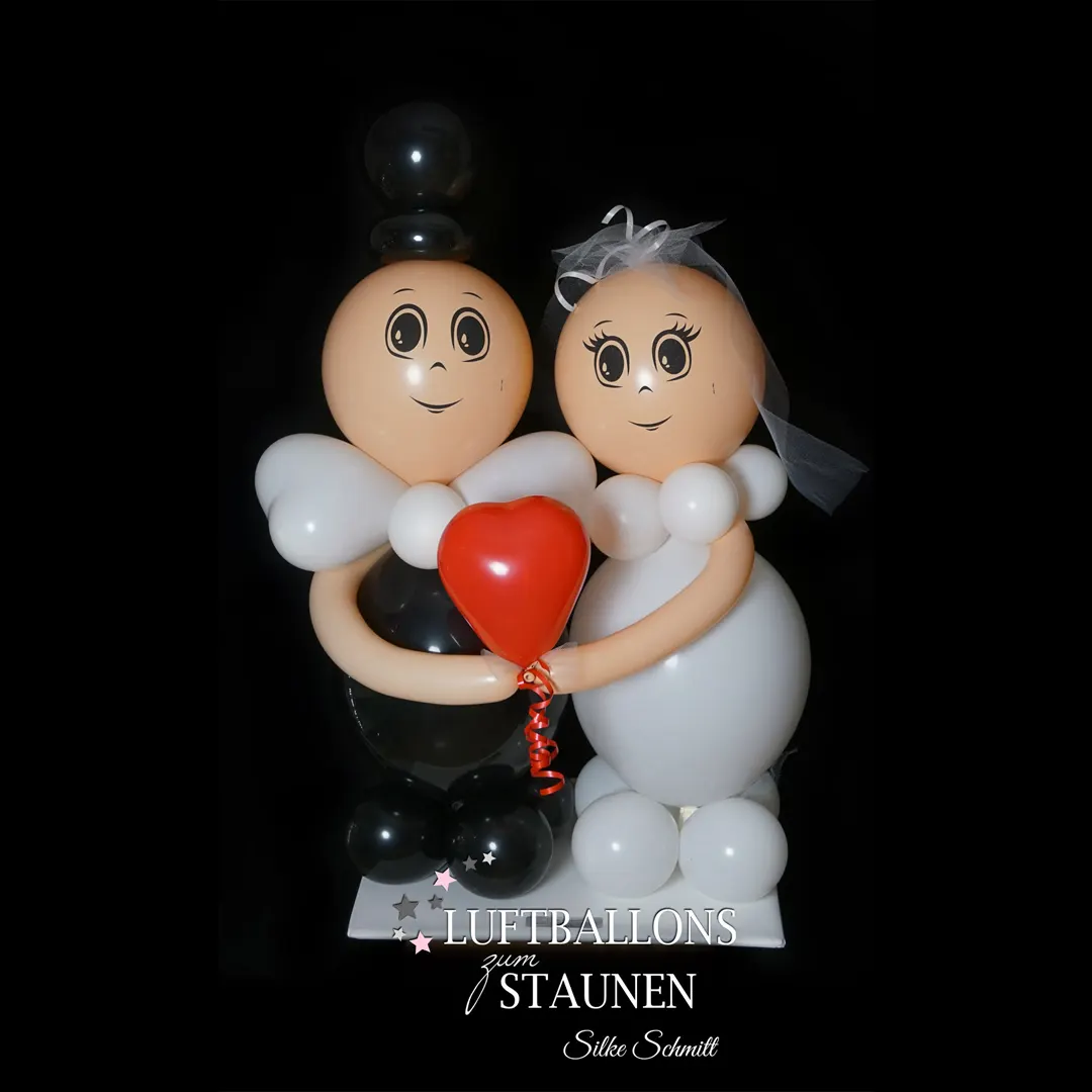 kleines Luftballon-Brautpaar mit Herz
