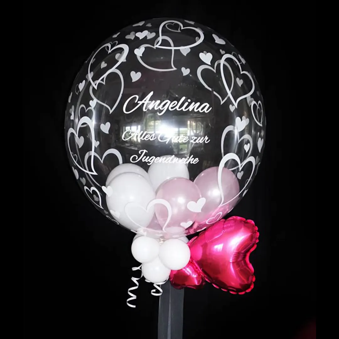 Herzförmiger Bubble-Ballon, ideal für Kommunion, Firmung oder Jugendweihe. Ein liebevolles und einzigartiges Geschenk, das den besonderen Tag verschönert.