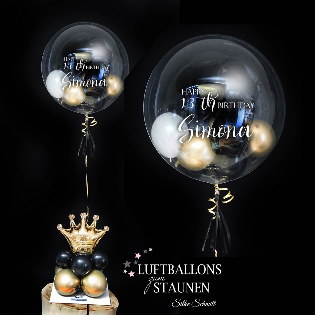 Ein exklusives Bubble-Geschenk, das beeindruckt! Kleiner Bubble gefüllt mit 6 Miniballons, eleganter Fuß mit Krone. Bestellbar mit oder ohne individueller Beschriftung. Höhe: ca. 1,2 m.